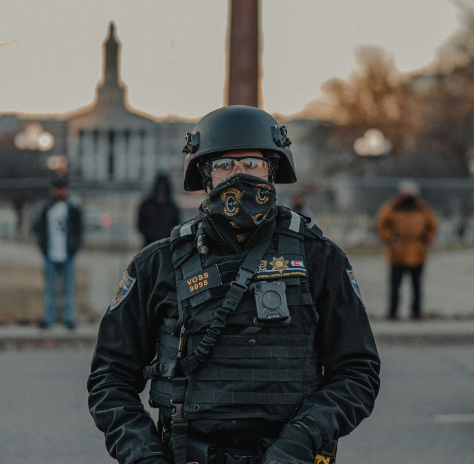 man in black jacket wearing black helmet